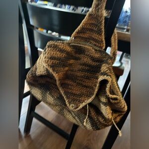 Handwoven jute cross body/shoulder purse with one button closure